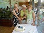 Sandra Faulkner, Michelle Cavanagh & Catherine Barker cut the birthday cake
